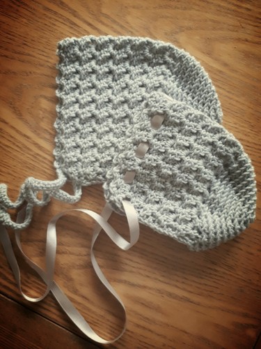 Cofano neonato colore grigio